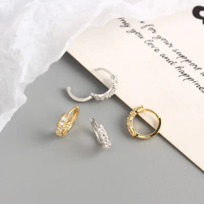 Her New Signature Hoop Earrings